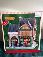 Front of boxed Lemax Caddington Post Office lighted building