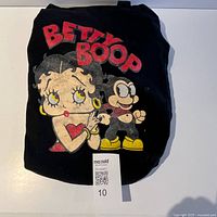 Front view showing faded Betty Boop and Bimbo graphic