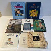 All seven books laid out face up