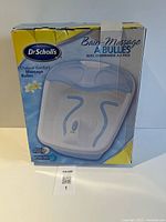 Front of boxed Dr. Scholl's foot spa showing product image and branding