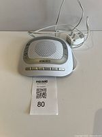 Full view of Homedics sound machine with cord