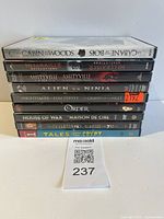 Stack of nine horror DVDs showing spines