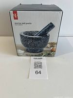 Front of retail box showing granite mortar and pestle