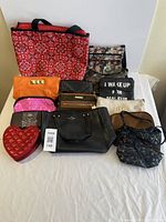 Group shot of all 11 bags and wallets