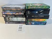 Stacked view of DVD cases showing titles and count