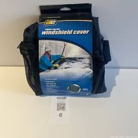 Front of packaged Winter Warrior windshield cover