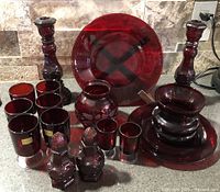 Group shot of entire ruby red glass lot showing quantity and variety