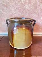 Front view showing glaze pattern and both handles