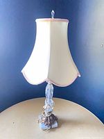 Full view of table lamp with shade