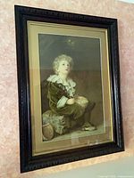 Frontal view of framed print on wall