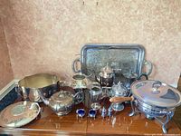 Group shot of all silver plated items on table
