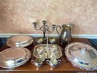 Group view of all silver-plated items on table