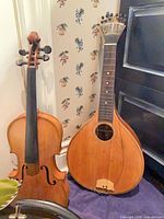 Lute and violin together showing overall condition