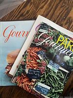 Three Gourmet magazines with colourful covers, partial view of stack