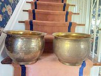 Both brass planters side by side showing overall shape and size