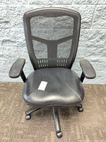 Front view of black mesh back office chair