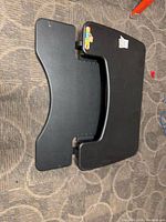 Top view of black Varidesk sit-stand converter showing work surface and keyboard tier