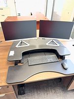 Overall view of Veridesk converter with two ViewSonic monitors, keyboard and mouse