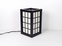 Full view of rectangular lantern lamp with cord