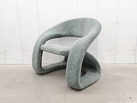 Front three-quarter view of sage green suede Jaymar tongue chair