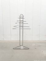 Full view of chrome corner towel stand front angle