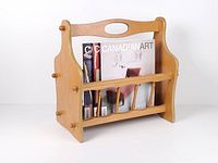 Front view of light wood magazine rack holding magazines