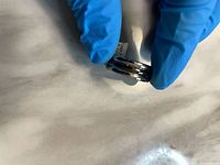 Ring with tag showing interior and size