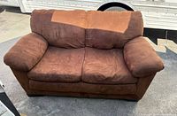 Front view of brown microfiber loveseat couch