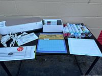 Full view of Cricut Maker bundle on table