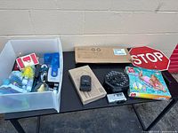 Overall lot on table with major items visible