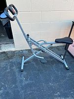 Full side view of Sunny Health & Fitness squat assist trainer
