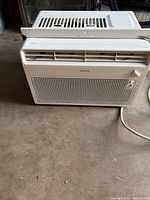 Front and top view showing grille, louvers, control dial, overall condition