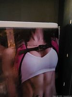 Front view of retail box showing model wearing vest