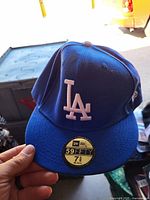 Royal blue New Era 59FIFTY Los Angeles Dodgers fitted cap with brim sticker visible