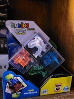 Front view of Rubik's Perplexus Hybrid puzzle cube in retail packaging