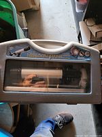 Front view of telescope kit in gray carry case showing white telescope tube and Land & Sky label