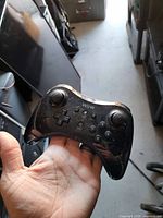 Front view of Nintendo Wii U Pro Controller showing buttons and sticks