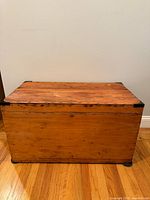 Front view of entire wooden chest