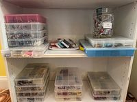 Full shelf view showing all storage boxes and jar