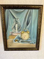 Full view of framed oil painting with still life subject