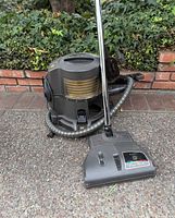 Full view of Rainbow E Series canister vacuum with hose, wand and power nozzle