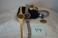 All four watches displayed upright for overview