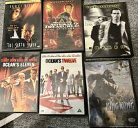 All six DVD cases grouped, showing front cover art