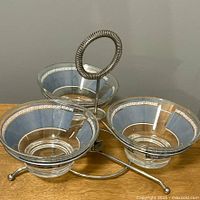 overhead view of complete condiment server showing three bowls in stand