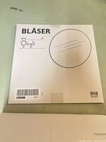 Front of IKEA Blåser mirror packaging showing product details