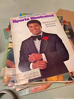 Cover with Muhammad Ali in tuxedo