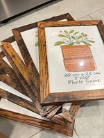 Stack of wooden 8x10 frames front view