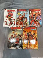 Front covers of all five Deadpool hardcovers