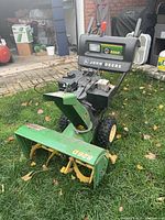 Front three-quarter view of entire snow blower