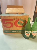 Labatt 50 cardboard case front and two bottles standing